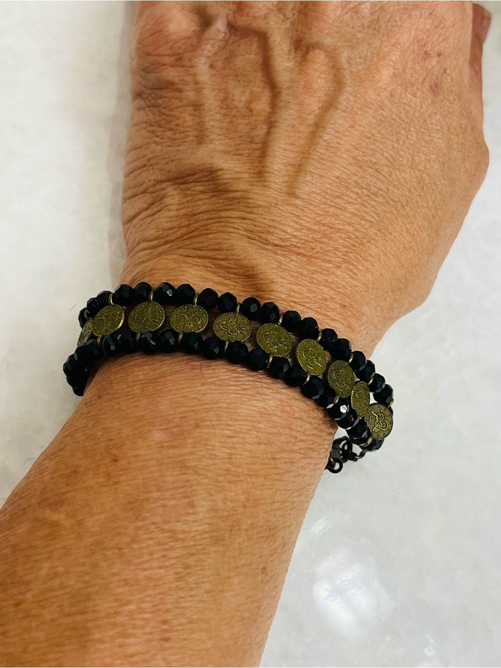 Black Beaded Wrap Bracelet with Brass Coin Accents